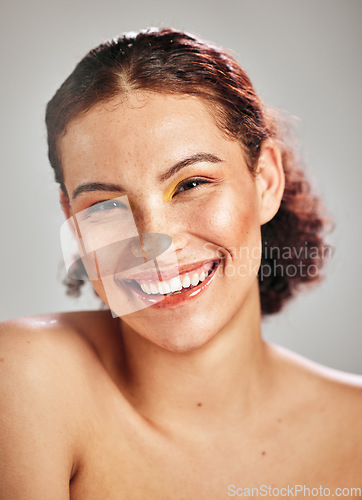 Image of Beauty makeup, face portrait and happy woman with luxury cosmetics eyeshadow, healthy skincare glow or self care. Facial cosmetology, spa salon and aesthetic model smile isolated on studio background