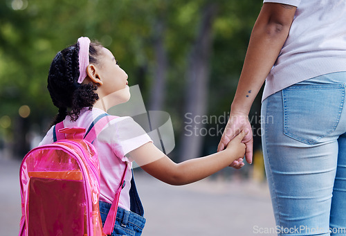 Image of Back, mother and girl holding hands, school and education for learning, bonding or talking. Knowledge, mama or daughter walking, conversation or support for child development, kindergarten and care