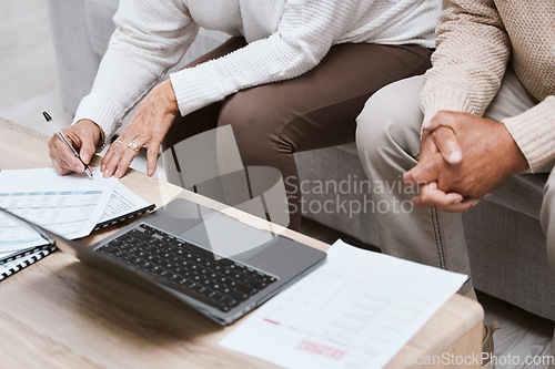 Image of Laptop, budget and senior couple in living room for retirement research, investment planning or asset management. Elderly people hands, writing finance data for loan, mortgage and financial documents