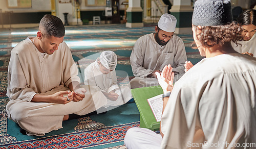 Image of Muslim, child or men prayer to worship Allah in holy temple or mosque with gratitude as a family on Ramadan. Islamic, community or people in praying with boy or kid for Gods support, spiritual peace