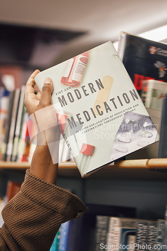 Image of Book in hand, library and student of medicine, pills and healthcare education and learning about pharmaceutical drugs. Black woman with reading information, learn and study, research for medical test