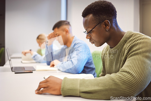 Image of Black man, students and studying for education, knowledge and focus for exams, campus and intelligent. African American male, student and young people on university, concentration and research notes