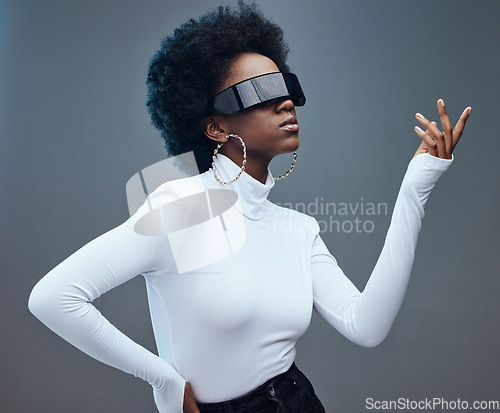 Image of Fashion, futuristic and black woman with sunglasses, cyberpunk and against a studio background. African American female, lady and gen z youth with beauty, designer glasses and marketing with vision