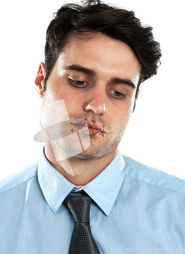 Image of Portrait of man with mouth sewn shut, mental health and silence isolated on white background. Victim censorship, depression and abuse, businessman and mens health narrative stitched lips in studio.