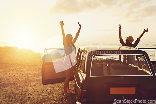 Image of Road trip, couple of friends and sunset beach for travel, journey and summer holiday celebration. Celebrate, arms in air and vintage, retro car for outdoor vacation, parking and nature drive by ocean