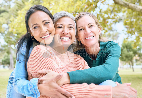 Image of Retirement, women or bonding hug for portrait profile picture, social media or lifestyle freedom blog in relax environment. Smile, happy or elderly senior friends in nature park, garden or community