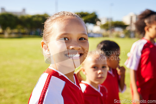 Image of Girl soccer player, portrait and field for training, teamwork and group diversity with smile. Young female kids, football group and happy for team building, learning and development with excited face