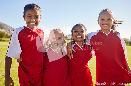 Image of Girl, soccer group portrait and field with smile, team building happiness and solidarity for sport training. Female kids, sports diversity and happy with friends, teamwork and learning in football