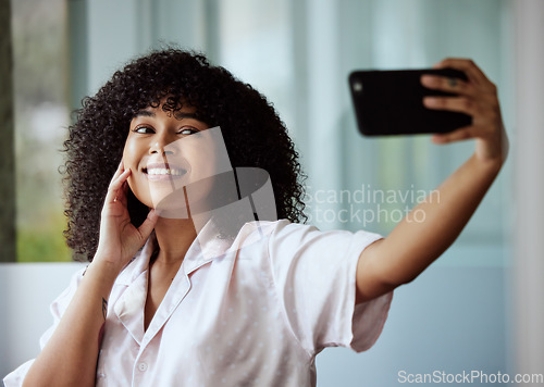 Image of Selfie, beauty and skincare with a black woman taking a picture in the bathroom of her home in the morning. Facial, phone and influencer with an attractive female posing for a social media photograph