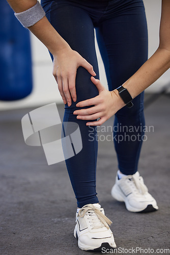 Image of Woman, fitness legs and knee pain in gym for wellness injury, exercise training and medical accident. Athlete workout, joint pain and cardio sports emergency, bone arthritis or body muscle tension