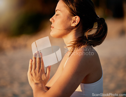 Image of Yoga meditation, prayer hands and profile of woman outdoors for health and wellness. Zen chakra, pilates fitness and female yogi with namaste hand pose for praying, training and mindfulness exercise.