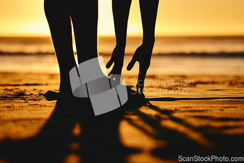 Image of Silhouette, sunset and yoga with fitness, stretching at the beach and body training, zen with nature. Person legs, hands and mockup, ocean with wellness and pilates, exercise and health with peace