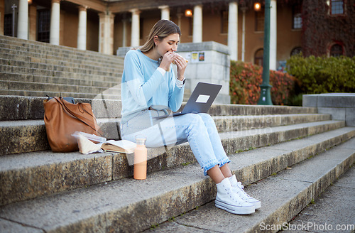 Image of College, study and food with woman and laptop for education, lunch break and academy research. University, knowledge and goal with girl student and sandwich on stairs of campus for relax and learning