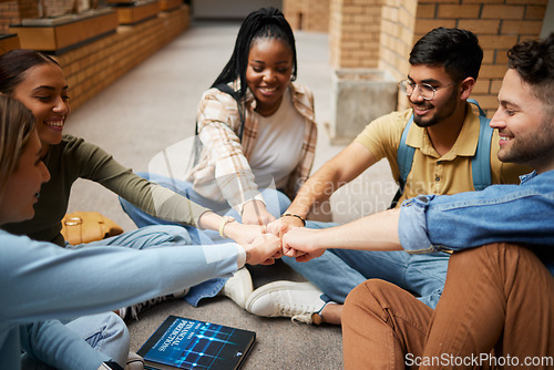 Image of Teamwork, fist bump and hands of students in university for collaboration, unity and motivation. Support, solidarity and group of people and friends huddle for education goals, learning or targets.