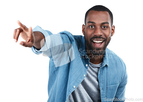 Image of Black man, studio portrait and pointing for happiness, excited or motivation by white background. Isolated African model, man and happy with hand sign for direction, vision or goals with edgy fashion