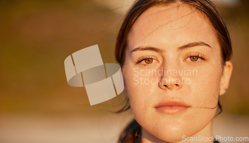 Image of Peace, zen and portrait of a calm woman at the beach with freedom, relax and stress relief in Bali. Wellness, young and face of a beautiful girl at the ocean for outdoor relaxation with mockup space