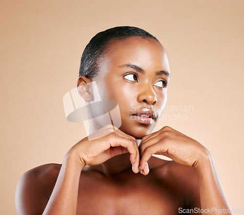 Image of Beauty, wellness and face of black woman with hands to promote luxury treatment, cosmetics and makeup. Spa aesthetic, skincare and female model on brown background for facial, shine and glowing skin