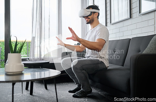 Image of Virtual reality, futuristic technology and man on sofa with headset for interactive, online and 3d games ux. User interface, digital tech and male relax with vr for metaverse, cyberspace and gaming
