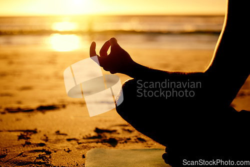 Image of Lotus, yoga and hands silhouette at beach outdoors for health, wellness and fitness. Sunset, zen meditation and shadow outline of man meditating, chakra training or mindfulness exercise at seashore.