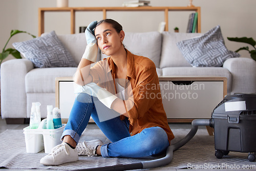 Image of Tired, sad and woman cleaning home overwhelmed, stressed and moody thinking of tasks. Spring cleaning fatigue of young girl thoughtful in house living room with cleaner hygiene products