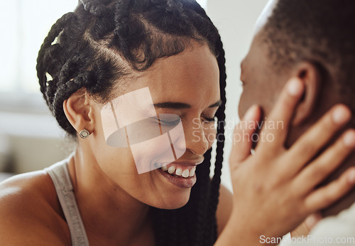 Image of Black couple, face and laugh in bedroom, romance and morning for bonding, care and romance in home. Happy couple, smile and touch for happiness, holiday or vacation in hotel room, apartment and relax