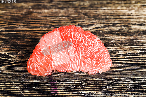 Image of a piece of peeled grapefruit