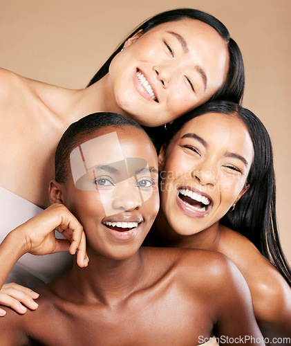 Image of Friends, diversity and skincare, women smile together in happy portrait on studio background. Health, wellness and luxury cosmetics for skin care and beautiful multicultural people in natural makeup.