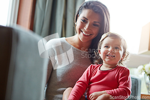 Image of Relax, happy and smile with mother and baby on sofa for bonding, quality time and child development. Growth, support and trust with mom and daughter in family home for health, connection and care