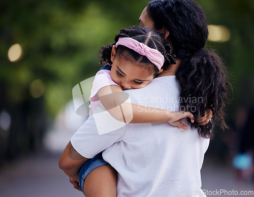 Image of Love, sad and mother carrying girl outdoors, bonding and hugging. Motherhood support, family care and woman embrace, hug or cuddle to comfort angry kid or child with anxiety, depression or problems.