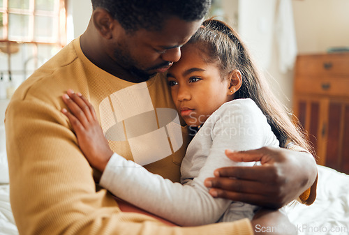 Image of Sick, illness and father with his child with pain, sad or problem in her bedroom at their home. Ill, care and African dad holding his girl kid with concern while she has the flu, cold or fever.