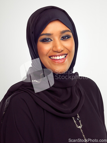 Image of Islamic woman, smile portrait and hijab for religious fashion, culture clothes and happiness n white background. Muslim girl, face and happy, religion head scarf and Arabic beauty isolated in studio