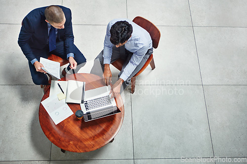 Image of Data analysis, diversity or business people with laptop for investment strategy, finance growth or research. Teamwork, search or manager on tech planning, global economy or networking in office lobby