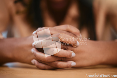 Image of Hands, pray and trust with a black woman asking god for help while praying alone in her home closeup. Worship, prayer and religion with a female praying for forgiveness in spiritual faith or belief