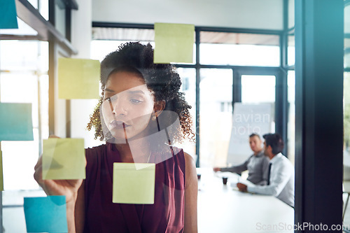 Image of Thinking, strategy or black woman for business schedule planning, creative idea or marketing review in meeting. Corporate, glass post it sticky note or manager for analytics or project management