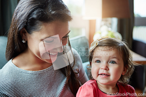 Image of Relax, happy and smile with mother and baby on sofa for bonding, quality time and child development. Growth, support and trust with mom and daughter in family home for health, connection and care