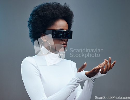 Image of Futuristic sunglasses, fashion and black woman, gen z youth and stylish with trendy designer brand against studio background. Young model, cyberpunk and natural curly hair with beauty and edgy style