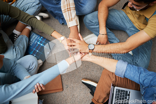 Image of Teamwork, hands and group of students in university for collaboration, unity or motivation. Support, solidarity and people or friends huddle for education goals, learning targets or success mindset.