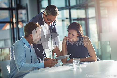 Image of Meeting, planning and business people with tablet in office for marketing strategy, ideas and online project. Teamwork, collaboration and managers sitting at desk for goals, target and our vision