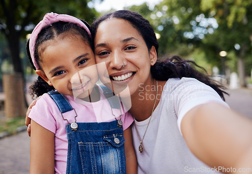 Image of Child, mother and selfie portrait of a mom and girl in a park with a happy smile outdoor. Happiness, family and mama love with parent care for kid on vacation together of a woman and young person