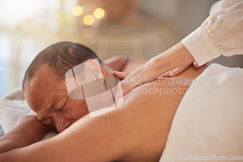 Image of Spa, man and massage for peace, luxury and relax for health, peace and lying on table. Male person, rich and self care for healthy lifestyle, zen treatment and grooming for stress relief and wellness