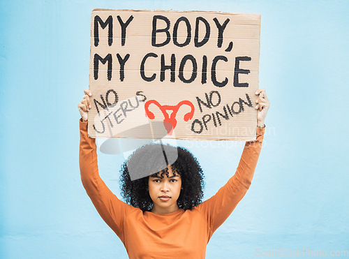 Image of Feminism, protest and portrait of a woman with a sign for human rights, abortion or political opinion. Strong, march and female from Mexico with a feminist board for change, empowerment and equality.