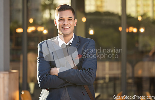 Image of Businessman, smile and portrait in urban city standing crossed arms for success, positive mindset and happiness outdoor. Corporate man, happy and confident face for business achievement in cityscape