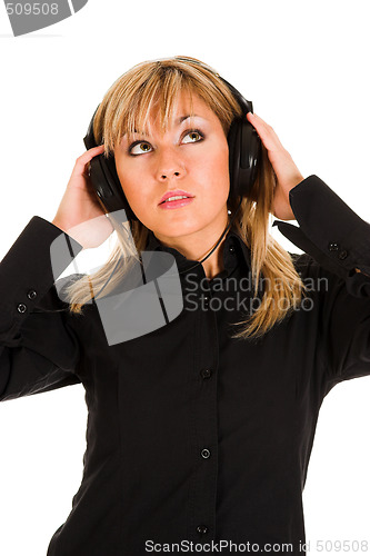 Image of woman listening music