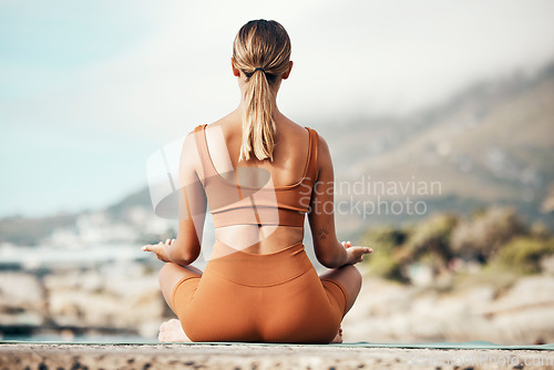 Image of Yoga woman, outdoor meditation and mountain for peace, mindfulness or balance chakra in morning. Zen meditate, spiritual wellness and training for energy, focus or self care by mountains in Cape Town
