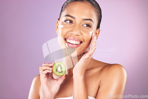 Image of Cream, kiwi and skincare woman in studio mock up for facial wellness, healthy glow and cosmetics advertising. model smile for vitamin c, nutrition or green fruit of dermatology product and self love