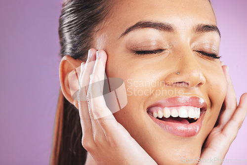 Image of Skincare, beauty and woman with hands on face for cosmetology, beauty products and dermatology. Cosmetics, makeup and happy girl on purple background for wellness, facial treatment and spa aesthetic