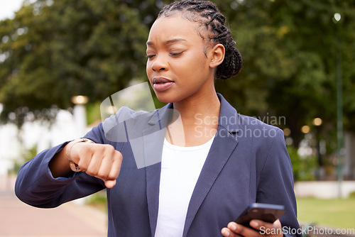 Image of Black woman, phone and time management for business schedule while outdoor with a watch at a park waiting for a meeting or taxi. Professional entrepreneur late and worried while walking in a city