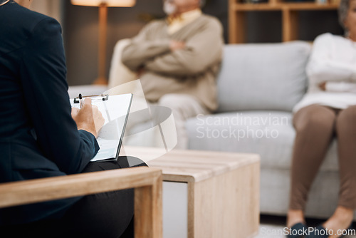 Image of Psychologist writing, divorce and couple in therapy, conversation and session in office. Therapist make notes, senior man and elderly woman with relationship problems, marriage issue and frustrated.