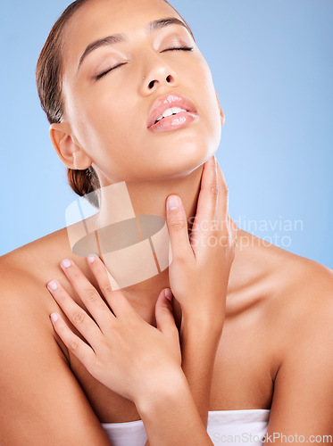 Image of Self love, beauty cosmetics and skincare woman for spa marketing, dermatology and body glow on a blue background in studio. Luxury, self care and calm model advertising natural care for skin