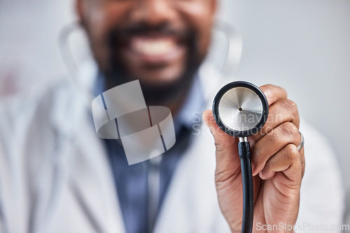 Image of Doctor, healthcare and closeup of stethoscope in hospital for a heart or lung consultation. Professional, cardiology and nurse with medical equipment to examine chest or breathing in medicare clinic.